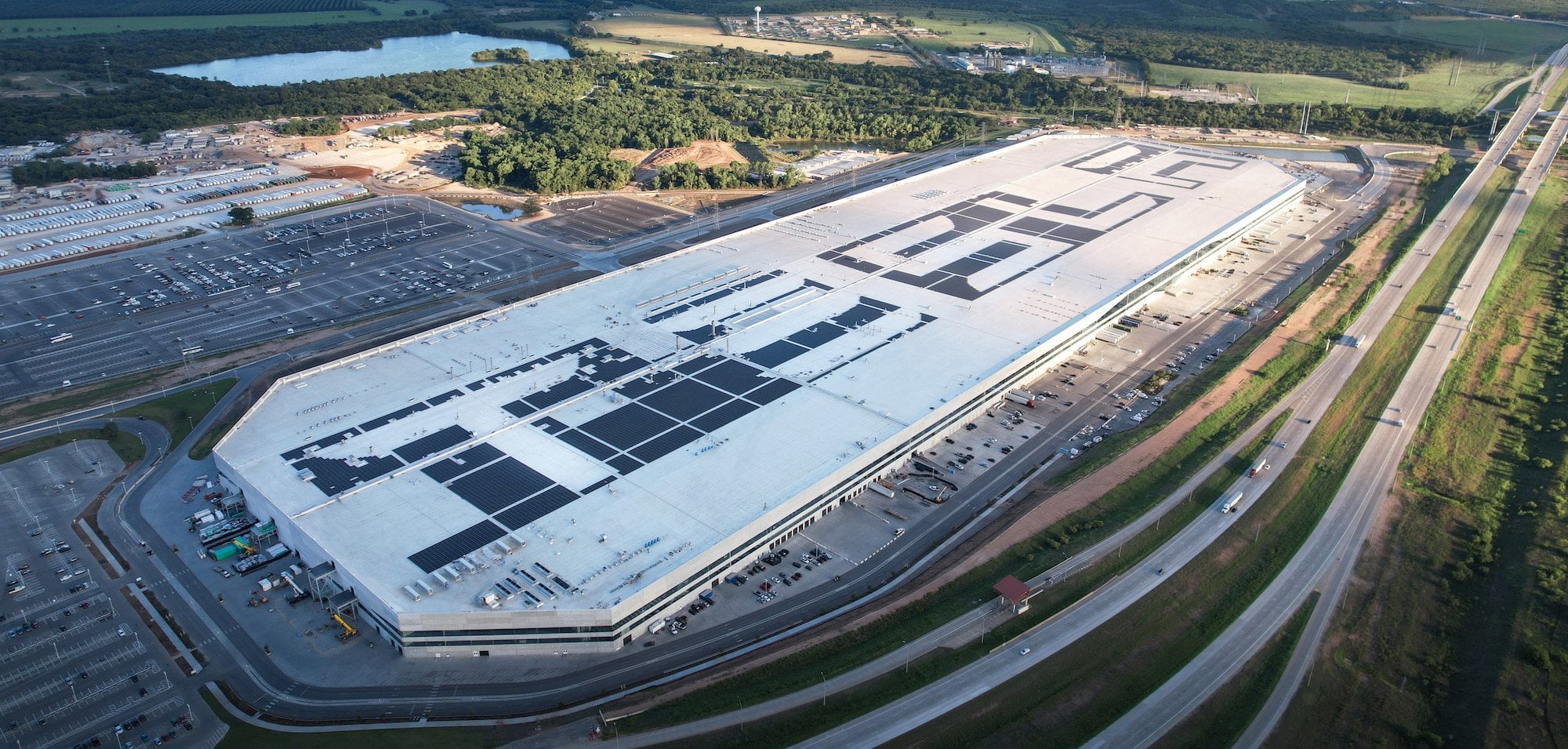 Aerial view of Tesla Giga Texas beside State Highway 130